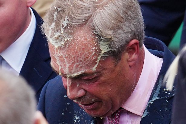 Racy adult star who ‘chucked milkshake’ at Nigel Farage is charged with assault